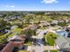 Aerial view of a neighborhood with tree lined streets and well maintained homes at 11803 70Th St, Largo, FL 33773