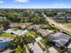 Aerial view of a neighborhood with tree lined streets and well maintained homes at 11803 70Th St, Largo, FL 33773