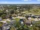 Expansive aerial view showcases a desirable residential neighborhood near a park with mature trees and winding waterways at 11803 70Th St, Largo, FL 33773