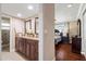 Spacious bathroom with dual sinks, granite countertops, and hardwood floors at 11803 70Th St, Largo, FL 33773