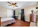 Well-lit bedroom features a ceiling fan, closet, and ample space for furniture at 11803 70Th St, Largo, FL 33773