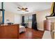 Bedroom featuring dark hardwood floors, closet and natural lighting at 11803 70Th St, Largo, FL 33773