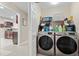 Convenient laundry room with washer and dryer units and plenty of storage space at 11803 70Th St, Largo, FL 33773