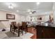 Inviting living room and dining area with stylish decor and a large sectional sofa at 11803 70Th St, Largo, FL 33773