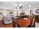 The living room offers ample seating, natural light, and comfortable furniture at 11803 70Th St, Largo, FL 33773