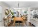 Dining area open to kitchen with views to additional living area at 145 38Th Ne Ave, St Petersburg, FL 33704