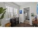 Sitting room or office with a beverage cooler and natural lighting at 145 38Th Ne Ave, St Petersburg, FL 33704
