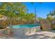 Backyard pool with water feature and wooden fence providing privacy at 145 38Th Ne Ave, St Petersburg, FL 33704