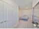 Bedroom features a closet and dresser at 1504 Colt Creek Pl, Wesley Chapel, FL 33543