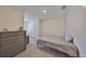 Bedroom features carpet, a storage drawer, and a closet at 1504 Colt Creek Pl, Wesley Chapel, FL 33543