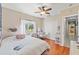 Bedroom with wooden floors and double door closet at 16340 Marquis Rd, Brooksville, FL 34614