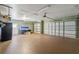 Spacious three car garage featuring multiple garage door bays at 16340 Marquis Rd, Brooksville, FL 34614