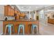 Bright kitchen with barstool seating at a breakfast bar and lots of natural light at 16340 Marquis Rd, Brooksville, FL 34614
