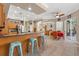 Open kitchen with breakfast bar and adjacent dining area at 16340 Marquis Rd, Brooksville, FL 34614