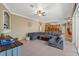 Open-concept living room with fireplace and comfortable seating at 16340 Marquis Rd, Brooksville, FL 34614