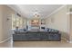 Comfortable living room with large sectional sofa and decorative fireplace at 16340 Marquis Rd, Brooksville, FL 34614