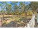 Large backyard offers plenty of space for outdoor activities and enjoying nature at 16340 Marquis Rd, Brooksville, FL 34614