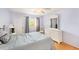 Comfortable bedroom with a window and dresser illuminated by soft natural light at 1900 59Th N Ave # 217, St Petersburg, FL 33714