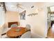 Cozy dining room features a ceiling fan, game table, and storage cabinet at 1900 59Th N Ave # 217, St Petersburg, FL 33714