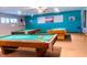 Spacious game room with multiple pool tables and comfortable seating at 1900 59Th N Ave # 217, St Petersburg, FL 33714