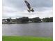 Scenic view overlooking a lake as an osprey flies overhead at 21537 Clubside Loop, Lutz, FL 33549