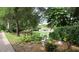 Peaceful water view with a gazebo perfect for relaxation and entertaining at 21537 Clubside Loop, Lutz, FL 33549