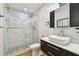 Modern bathroom with walk-in shower, vessel sink, and sleek vanity at 2259 Costa Rican Dr # 23, Clearwater, FL 33763