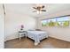 Cozy bedroom with ceiling fan, natural light and laminated wood flooring at 2259 Costa Rican Dr # 23, Clearwater, FL 33763