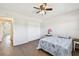 Bedroom with ceiling fan, closet and laminated wood flooring at 2259 Costa Rican Dr # 23, Clearwater, FL 33763