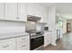 Bright kitchen featuring white cabinetry, stainless steel appliances and modern finishes at 2259 Costa Rican Dr # 23, Clearwater, FL 33763