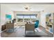 Bright office space featuring two desks, pool views, and plenty of natural light at 2259 Costa Rican Dr # 23, Clearwater, FL 33763