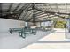 Picnic area with multiple tables shaded by an open-air structure for outdoor enjoyment at 2259 Costa Rican Dr # 23, Clearwater, FL 33763