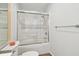 Neat bathroom featuring a clean tub and shower combination with glass doors and modern fixtures at 2259 Costa Rican Dr # 23, Clearwater, FL 33763