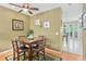 Dining area with hardwood floors and views to kitchen at 3005 Bayshore Pointe Dr, Tampa, FL 33611