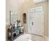 Well-lit entryway with tile floors and accent decor at 3005 Bayshore Pointe Dr, Tampa, FL 33611