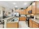 Kitchen with granite countertops, stainless appliances, and ample cabinet space at 3005 Bayshore Pointe Dr, Tampa, FL 33611