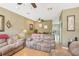 Comfortable living room area with multiple seating options and ceiling fans at 3005 Bayshore Pointe Dr, Tampa, FL 33611