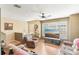Bright living room with a large window, comfortable seating, and ceiling fan at 3005 Bayshore Pointe Dr, Tampa, FL 33611