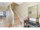 Staircase featuring hardwood steps and a neutral color palette at 3005 Bayshore Pointe Dr, Tampa, FL 33611