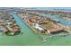 Stunning aerial view of waterfront condos with private boat slips and community amenities at 301 Madeira Cir, Tierra Verde, FL 33715