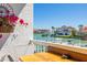 Balcony offers beautiful views of the canal and lush tropical landscaping at 301 Madeira Cir, Tierra Verde, FL 33715