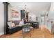 Charming dining area with chandelier lighting, seamlessly connecting to the updated kitchen at 301 Madeira Cir, Tierra Verde, FL 33715