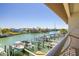 Breathtaking waterfront views from the balcony, showcasing boat docks and waterfront living at 301 Madeira Cir, Tierra Verde, FL 33715