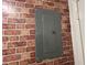 Home electrical panel on brick wall at 601 N Hercules Ave # 403, Clearwater, FL 33765