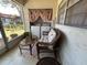 Home patio with cushioned seating and a washer and dryer set at 601 N Hercules Ave # 403, Clearwater, FL 33765