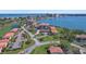 High angle view of residential condos with well maintained greenery and neighborhood streets at 6158 Palma Del Mar S Blvd # 406, St Petersburg, FL 33715