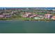 Breathtaking aerial view of waterfront condos with community pool and lush landscaping at 6158 Palma Del Mar S Blvd # 406, St Petersburg, FL 33715