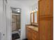 Bathroom with vanity, granite countertop, and tiled walk-in shower at 6158 Palma Del Mar S Blvd # 406, St Petersburg, FL 33715