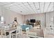 Common area with seating, tables, television, and neutral decor at 6265 Sun Blvd # 806, St Petersburg, FL 33715