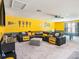 Spacious basement with a sports theme, featuring a large seating area, a television, and a pool table at 7494 Pool Compass Loop, Wesley Chapel, FL 33545